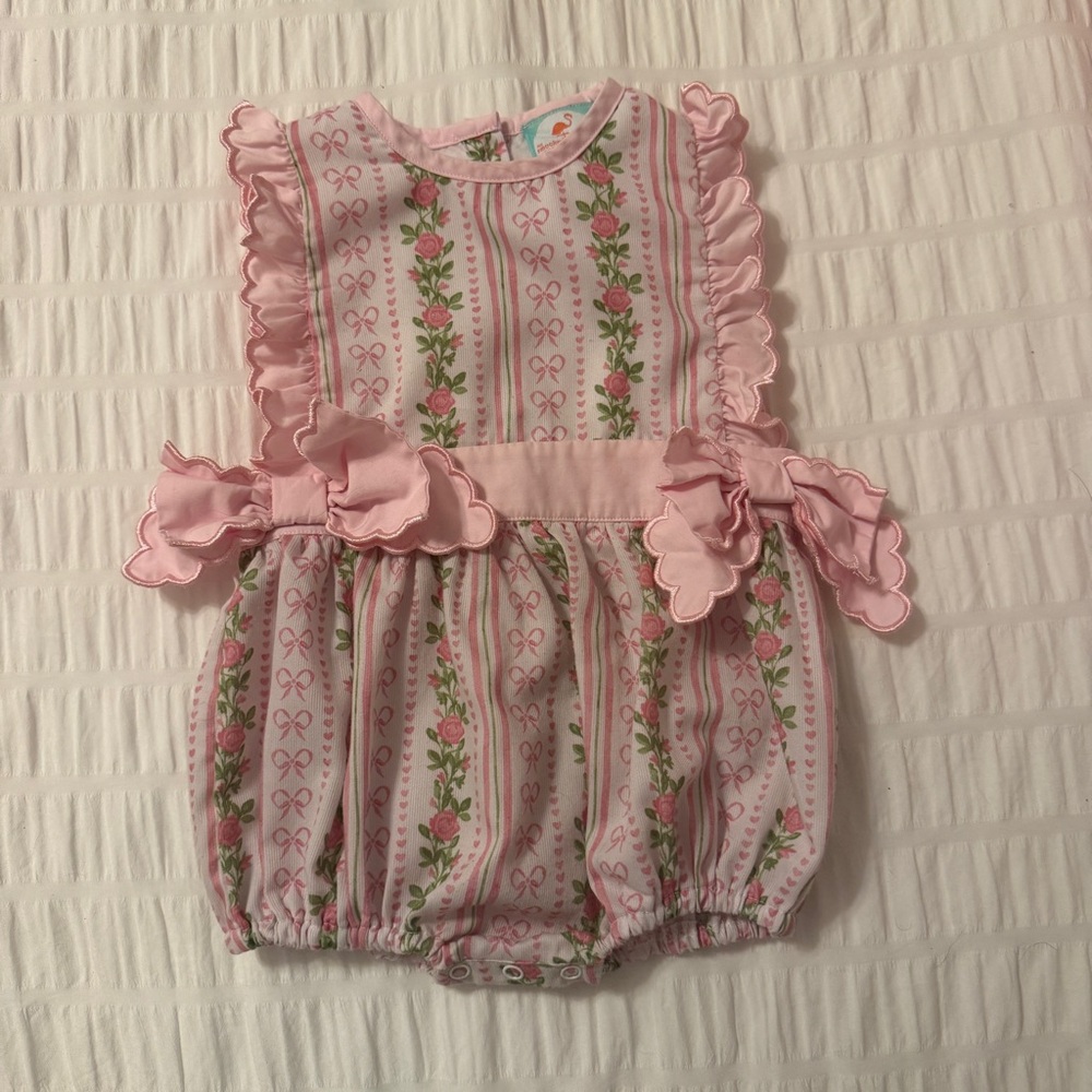 The Smocked Flamingo Pink Floral Ruffle Bow LSF style Baby Smock
